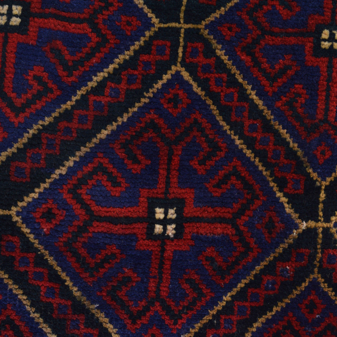 Afghan Baluchi Rug 2' 11" x 4' 2" Hand-Knotted close-up