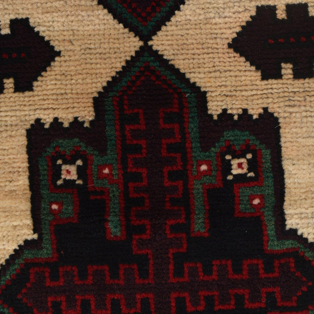 Afghan Baluchi Rug 2' 9" x 4' 2" Hand-Knotted close-up