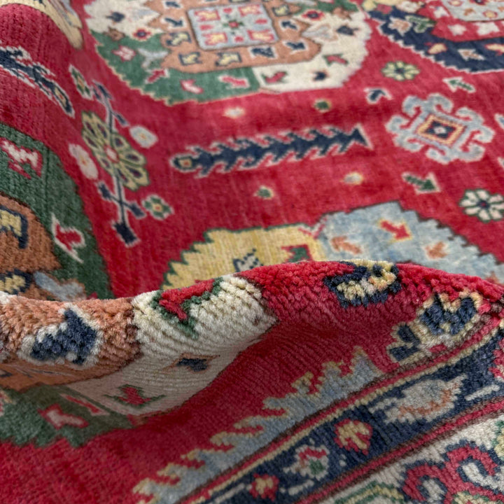 Red Afghan Kazak Rug 4' 0" x 5' 10" Hand-Knotted texture