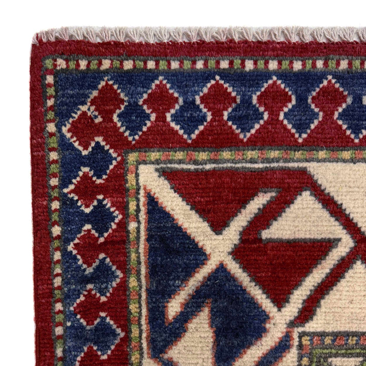 Red Afghan Kazak Rug 6' 4" x 9' 7" Hand-Knotted pattern