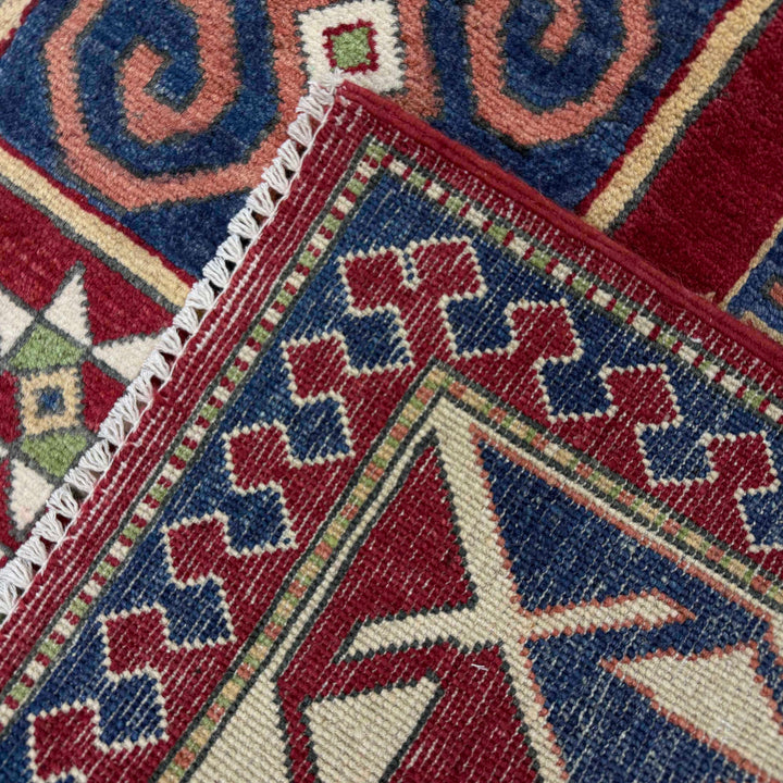 Red Afghan Kazak Rug 6' 4" x 9' 7" Hand-Knotted border