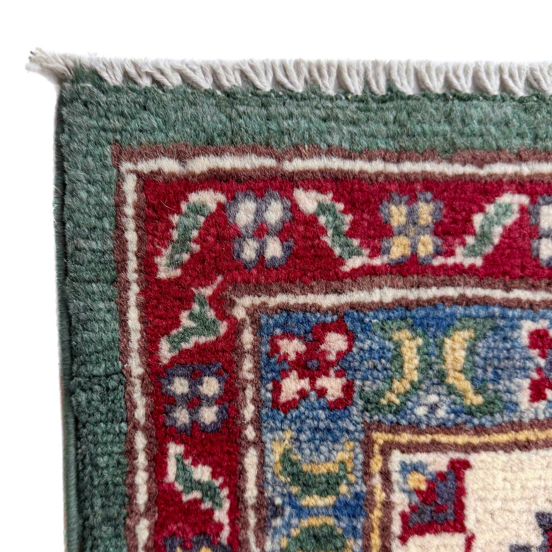 Green Afghan Kazak Rug 6' 9" x 10' 0" Hand-Knotted pattern
