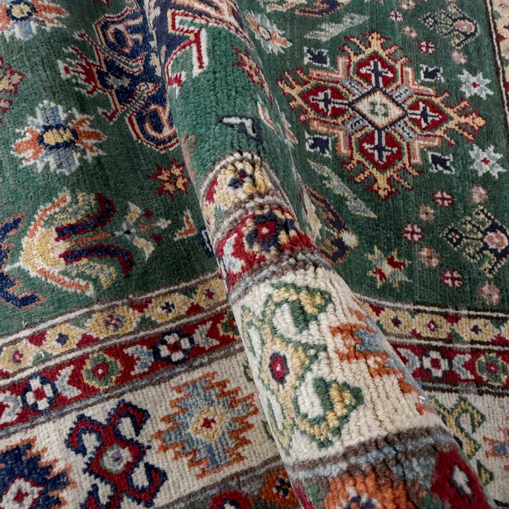 Green Afghan Kazak Rug 3' 1" x 4' 11" Hand-Knotted texture