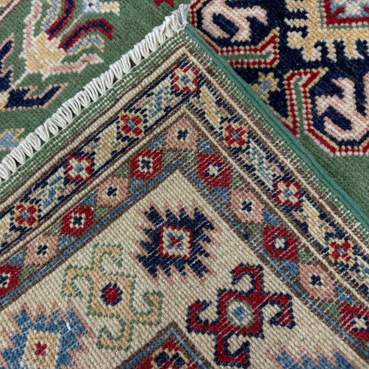 Green Afghan Kazak Rug 3' 3" x 5' 0" Hand-Knotted border