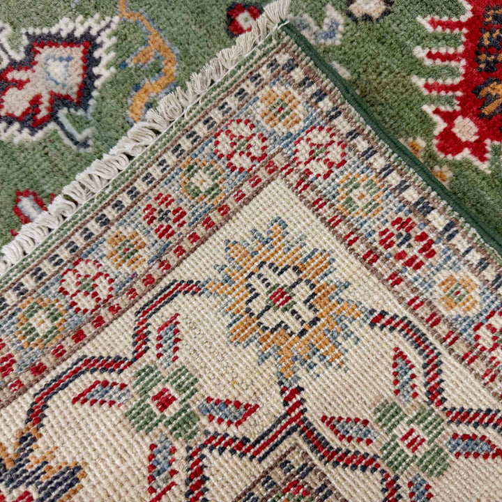 Green Afghan Kazak Rug 3' 3" x 4' 11" Hand-Knotted border