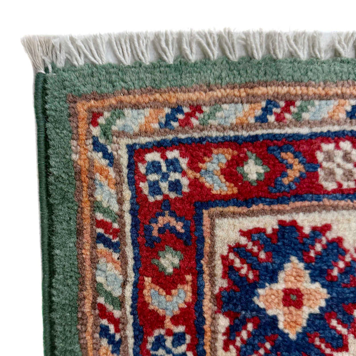 Green Afghan Kazak Rug 3' 2" x 4' 9" Hand-Knotted pattern