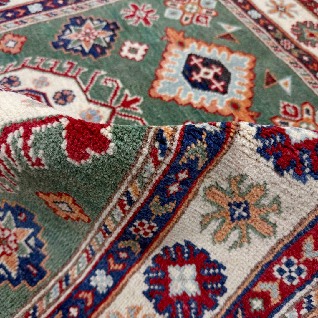 Green Afghan Kazak Rug 3' 2" x 4' 9" Hand-Knotted texture