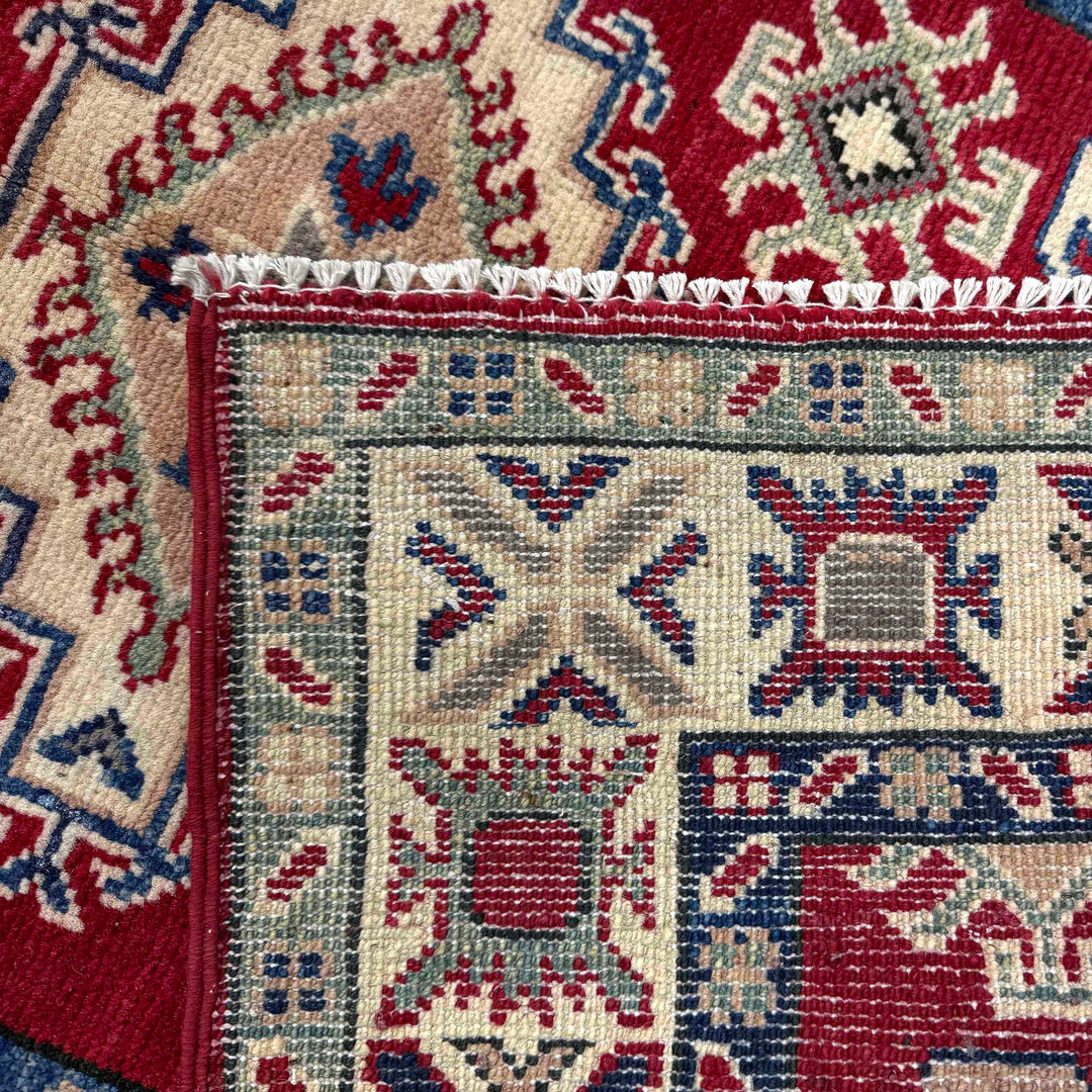Red Afghan Kazak Rug 2' 9" x 4' 2" Hand-Knotted border