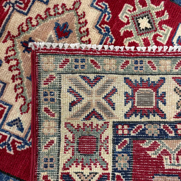 Red Afghan Kazak Rug 2' 9" x 4' 2" Hand-Knotted border