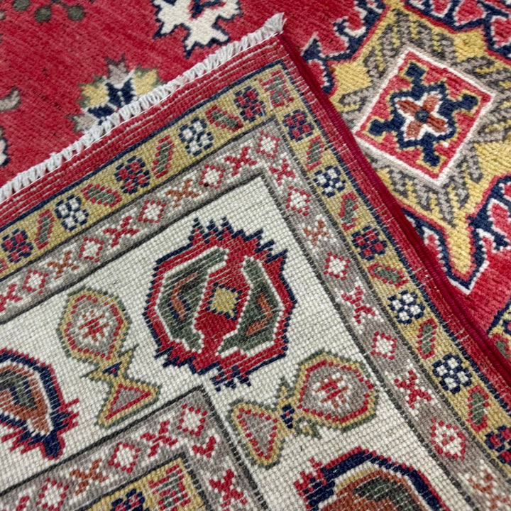 Red Afghan Kazak Rug 4' 11" x 6' 4" Hand-Knotted border