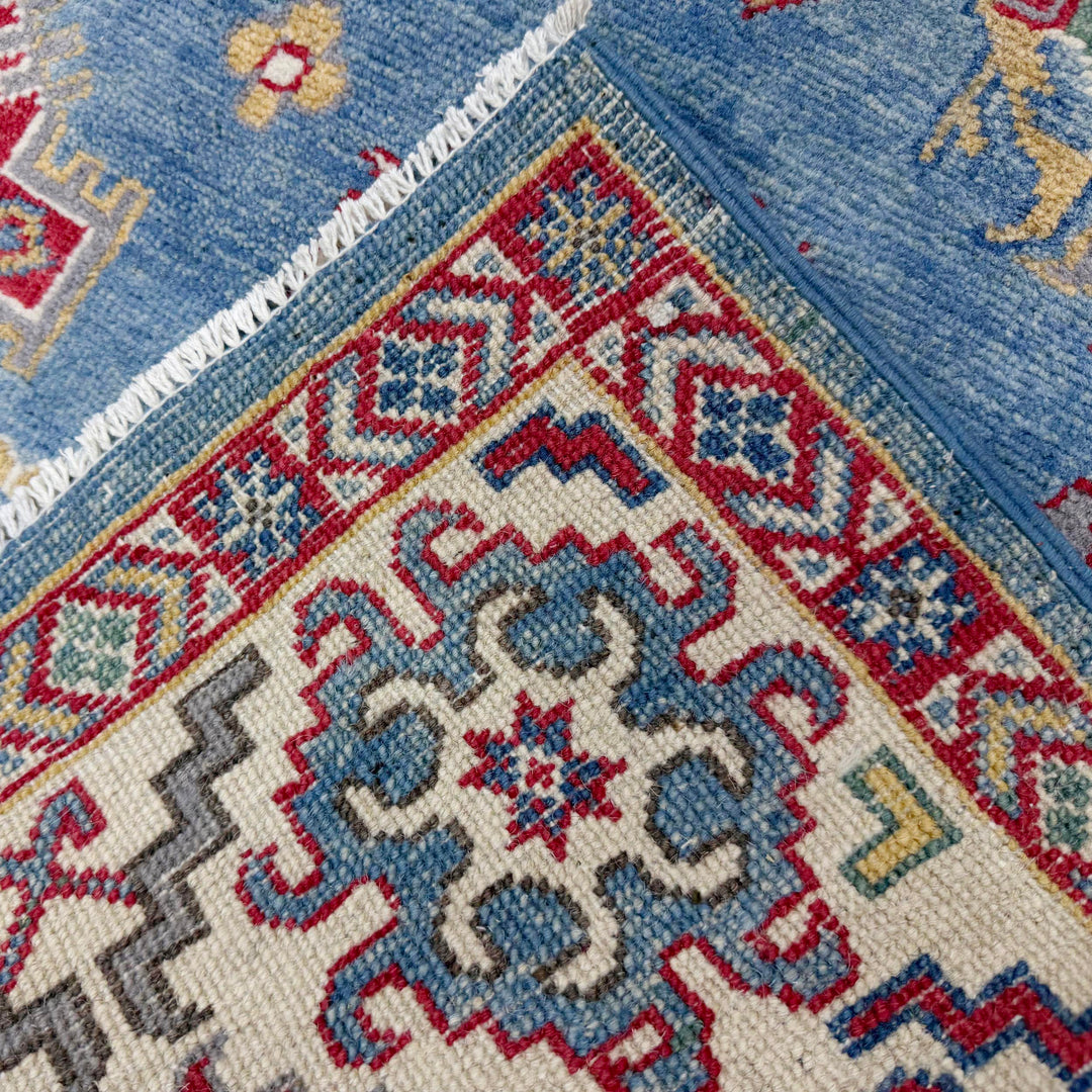 Blue Afghan Kazak Rug 5' 5" x 7' 10" Hand-Knotted border