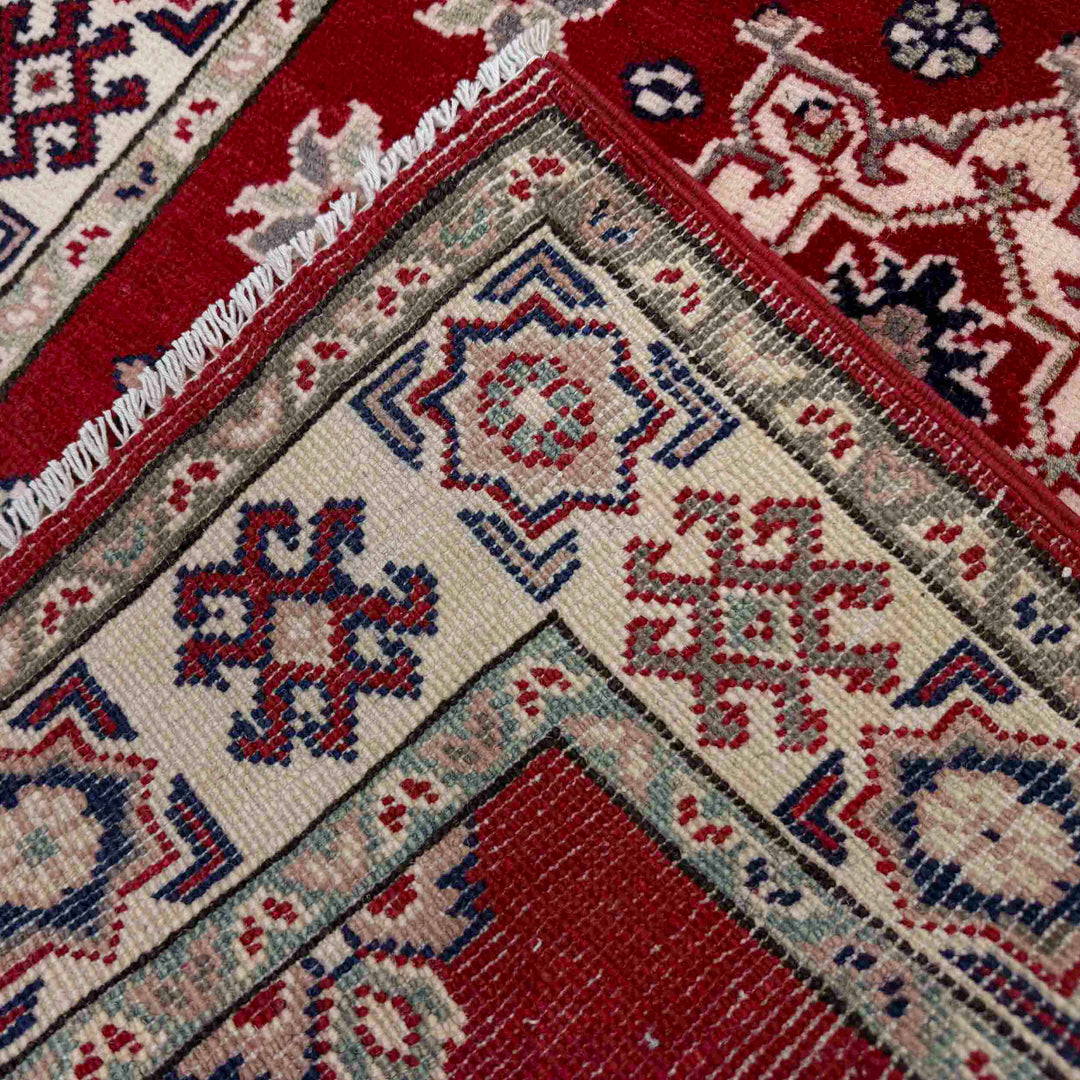 Red Afghan Kazak Rug 2' 7" x 4' 0" Hand-Knotted border