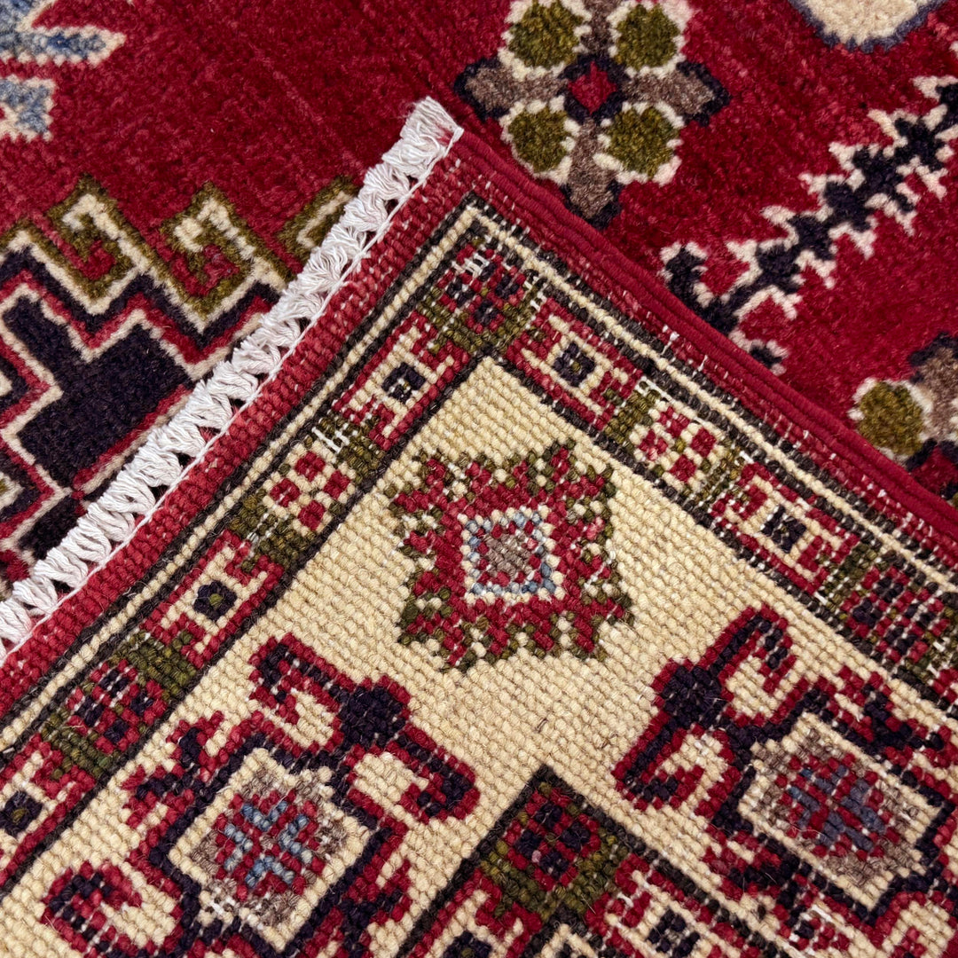 Red Afghan Kazak Rug 2' 7" x 4' 2" Hand-Knotted border