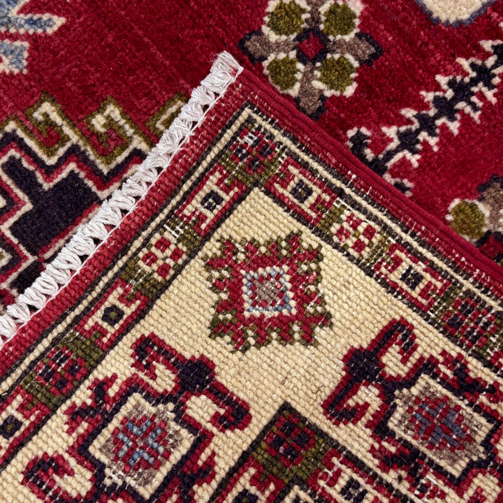 Red Afghan Kazak Rug 2' 7" x 4' 2" Hand-Knotted border