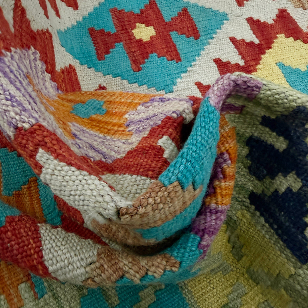 Afghan Vegetable Kilim Rug 3' 3" x 5' 5" Flat-Weave texture