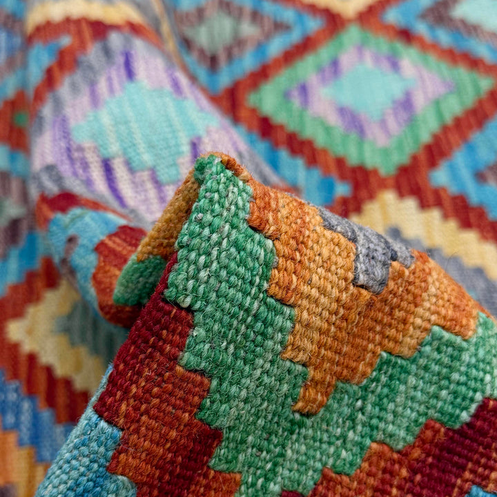 Afghan Kilim Rug 4' 10" x 6' 5" Flat-Weave texture