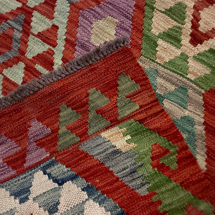 Afghan Kilim Rug 6' 11" x 9' 7" Flat-Weave border