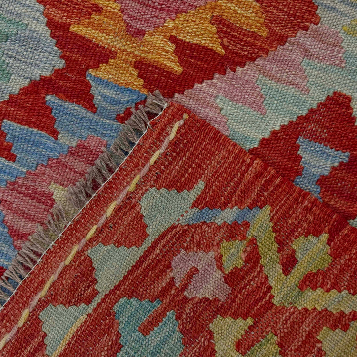 Afghan Kilim Rug 4' 9" x 6' 5" Flat-Weave border