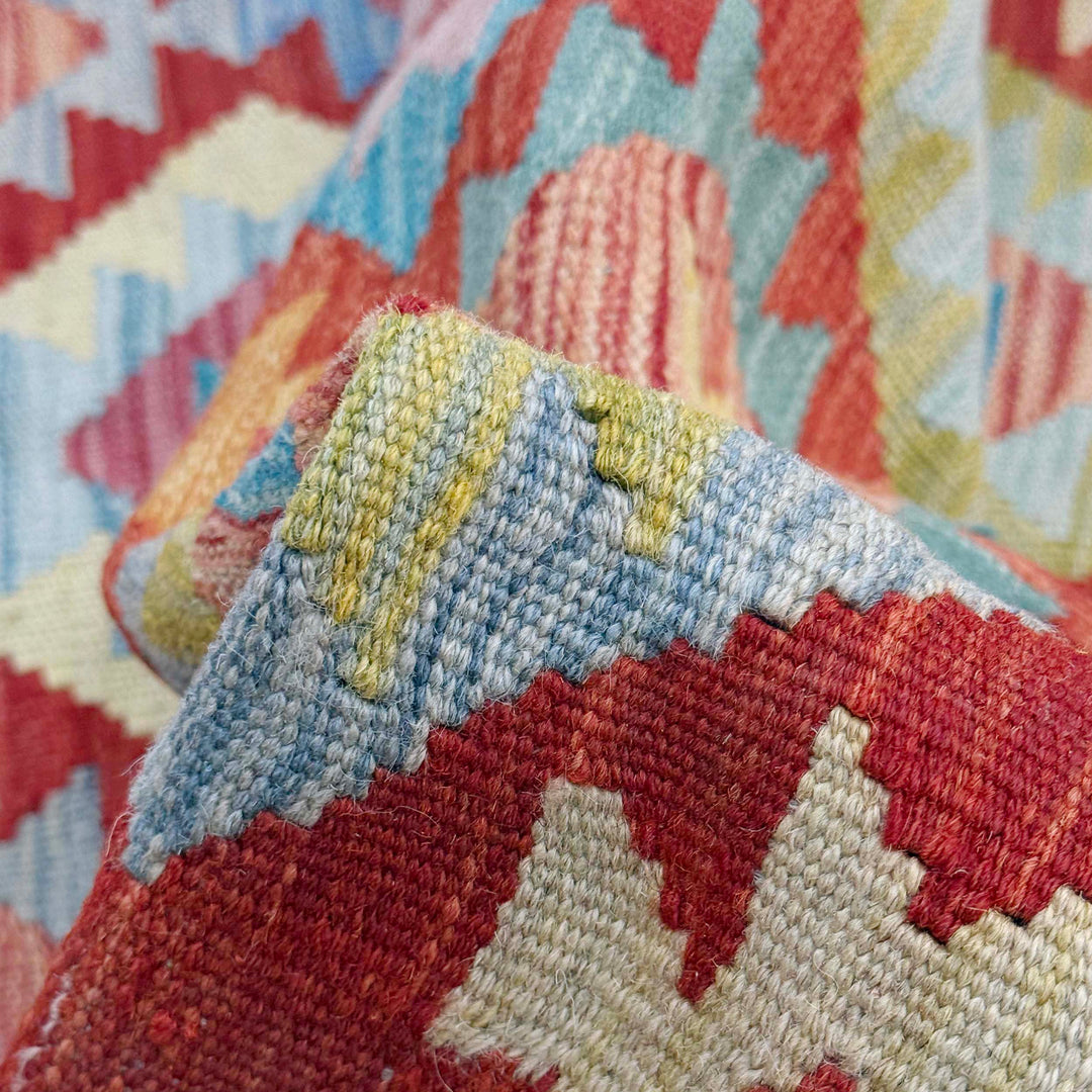 Afghan Kilim Rug 4' 9" x 6' 5" Flat-Weave texture