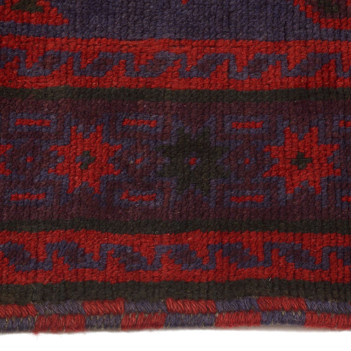 Afghan Baluchi Rug 4' 0" x 6' 5" Hand-Knotted detail