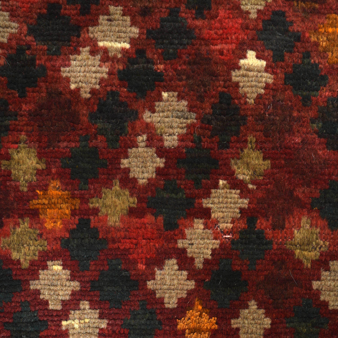 Red Afghan Baluchi Rug 3' 11" x 5' 5" Hand-Knotted close-up
