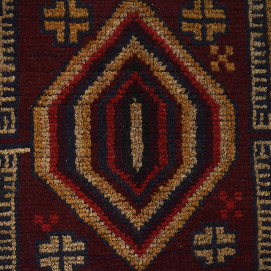 Afghan Baluchi Rug 3' 10" x 6' 4" Hand-Knotted close-up