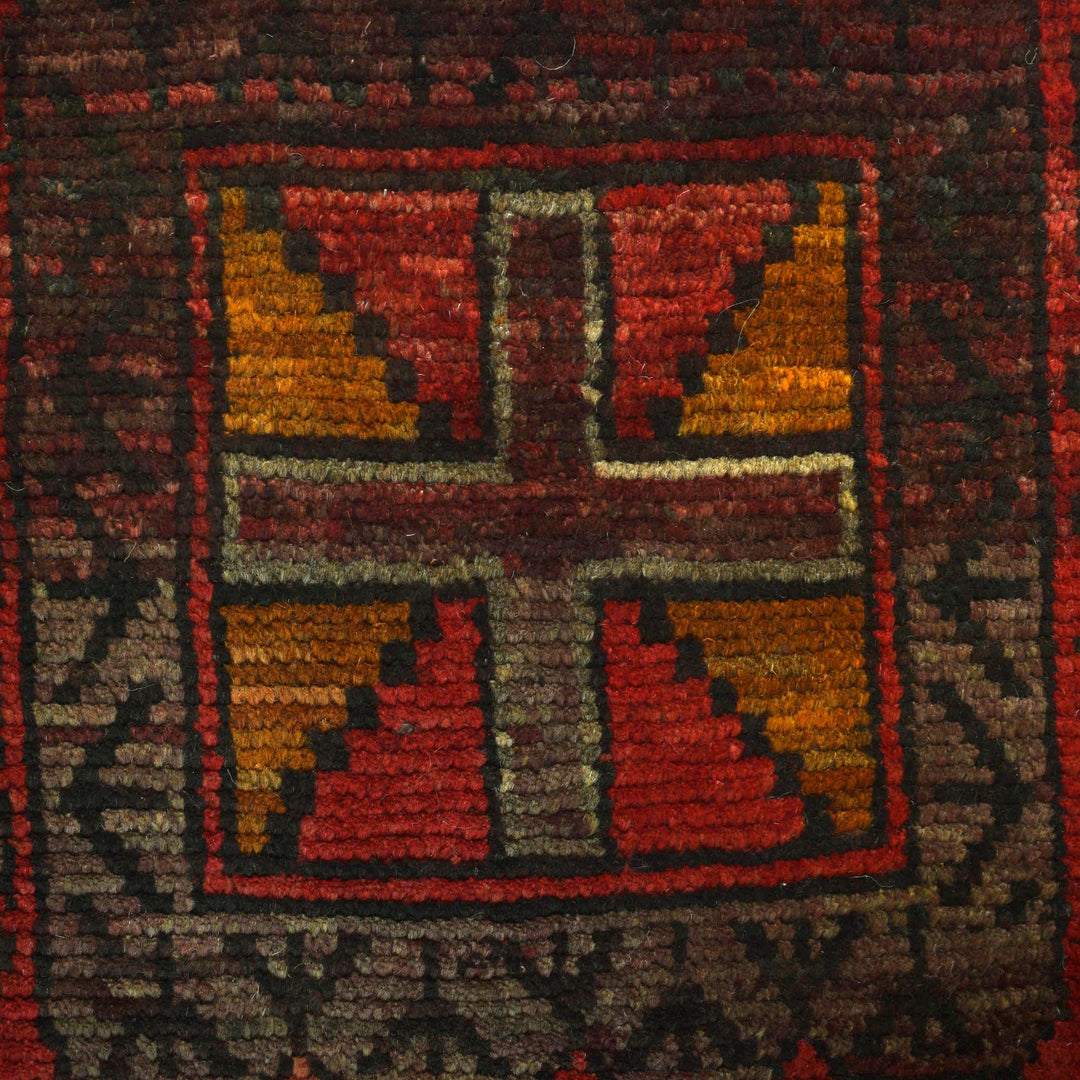 Red Afghan Baluchi Rug 3' 9" x 5' 10" Hand-Knotted close-up