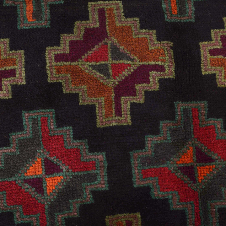 Black Afghan Baluchi Rug 3' 11" x 6' 1" Hand-Knotted close-up