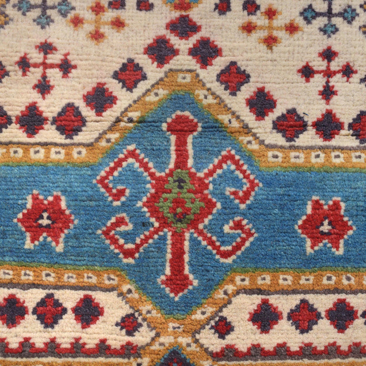 Beige Afghan Kazak Rug 4'7" x 6'6" Hand-Knotted close-up