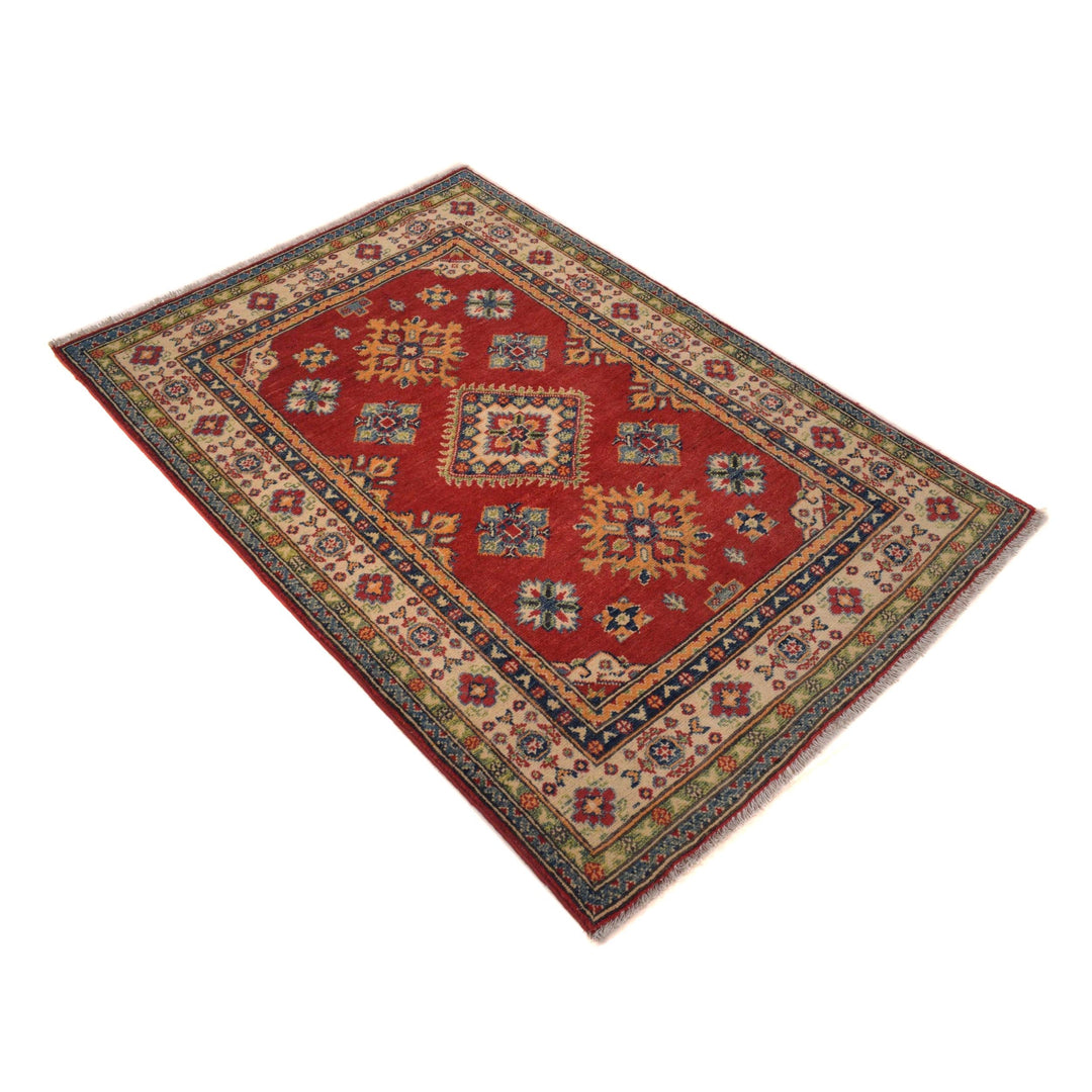 Red Afghan Kazak Rug 3' 3" x 4' 9" Hand-Knotted close-up