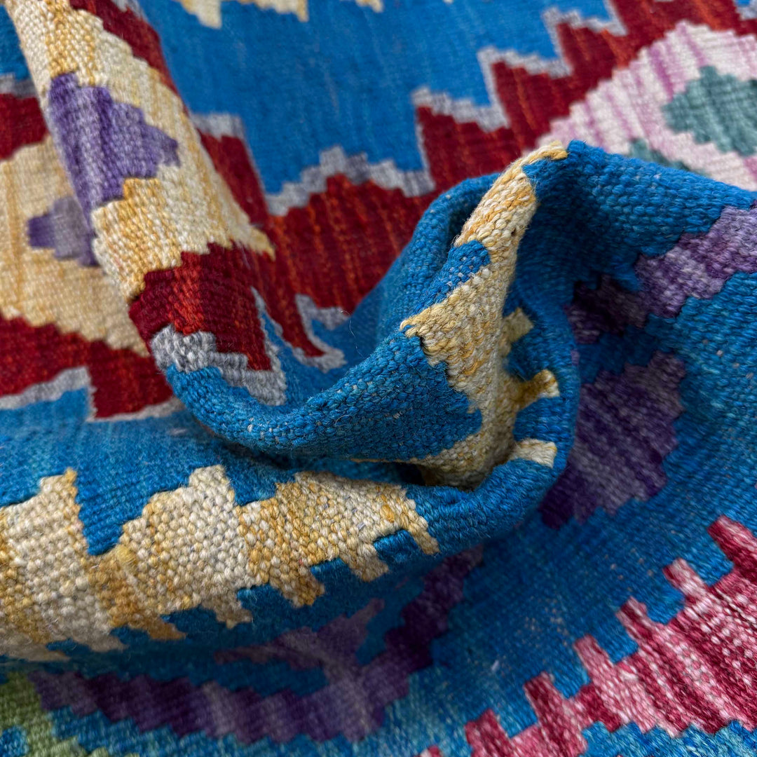 Afghan Kilim Rug 4' 0" x 5' 9" Flat-Weave texture