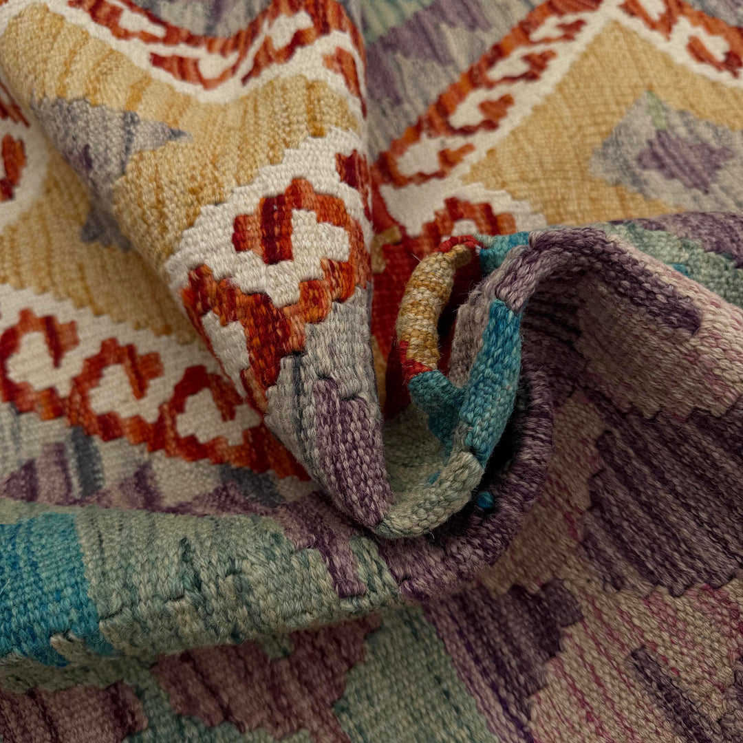 Afghan Kilim Rug 4' 10" x 6' 2" Flat-Weave texture