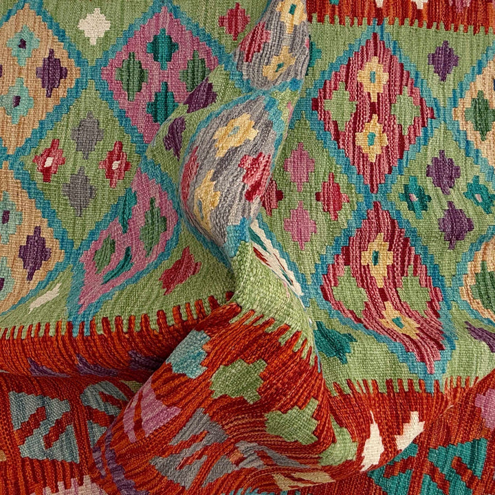 Afghan Vegetable Kilim Rug 4' 3" x 5' 8" Flat-Weave texture
