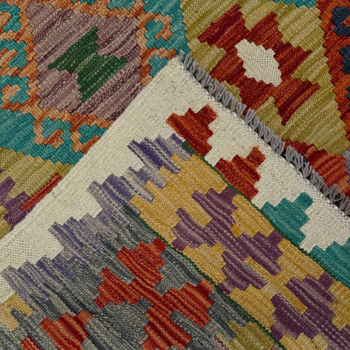 Afghan Kilim Rug 4' 1" x 5' 9" Flat-Weave border