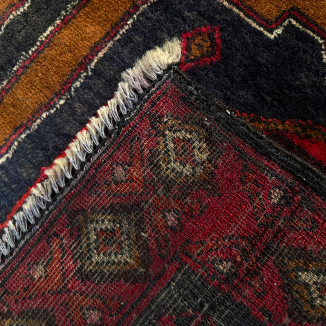 Afghan Baluchi Rug 4' 8" x 8' 7" Hand-Knotted border