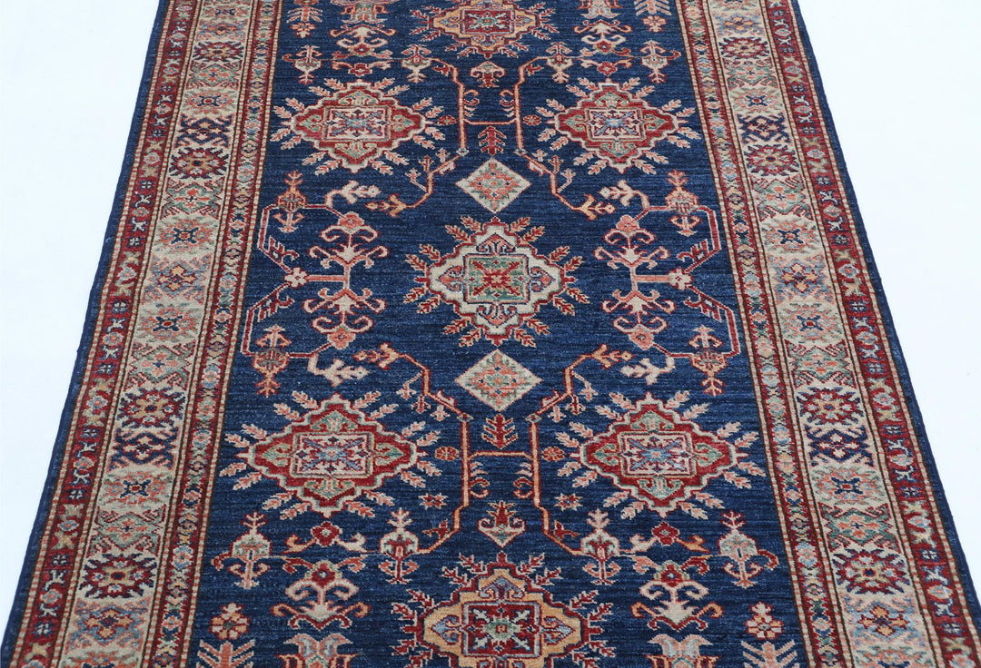 Kazak 4’ 0″ x 5’ 5″ - No. AV40946 - ALRUG Rug Store