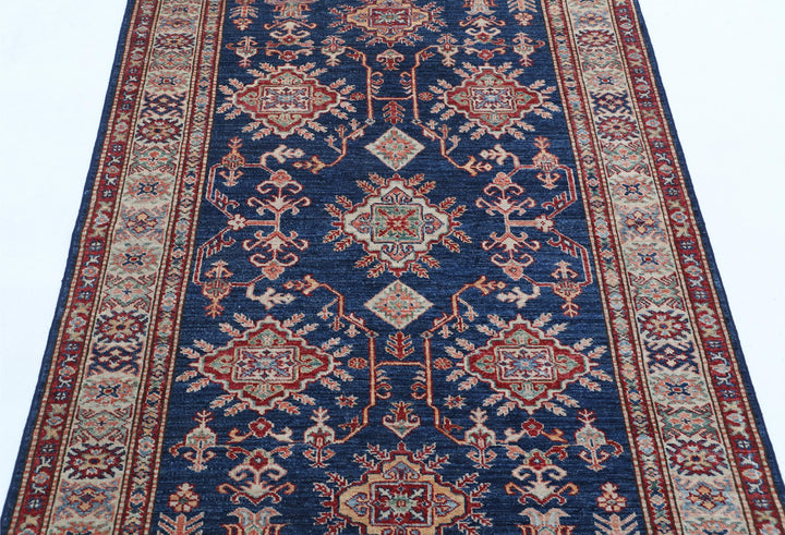 Kazak 4’ 0″ x 5’ 5″ - No. AV40946 - ALRUG Rug Store