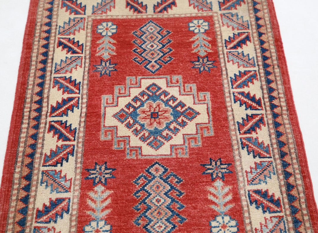 Kazak 2’ 2″ x 3’ 4″ - No. AV41563 - ALRUG Rug Store