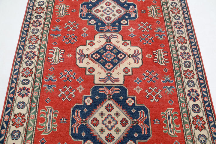 Kazak 4’ 11” x 6’ 6″ - No. AV69664 - ALRUG Rug Store