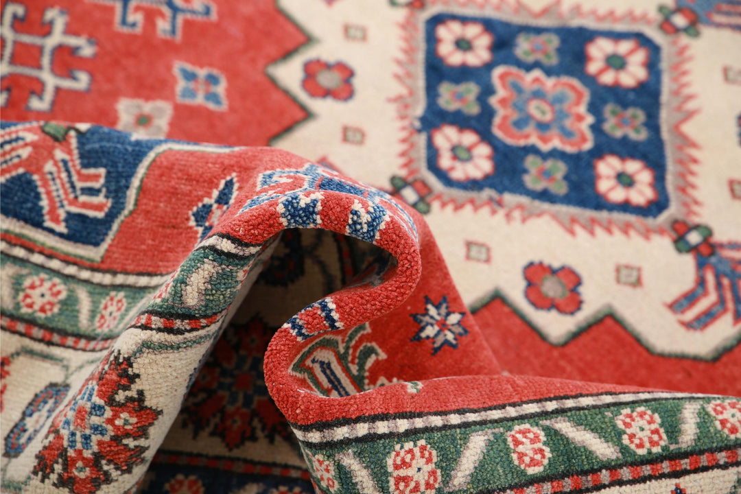 Kazak 4’ 11” x 6’ 6″ - No. AV69664 - ALRUG Rug Store