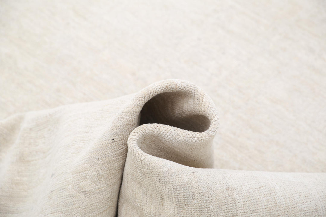 Khotan 5’ 11” x 8’ 8″ - No. AV26528 - ALRUG Rug Store