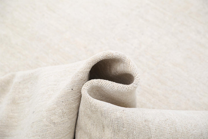 Khotan 5’ 11” x 8’ 8″ - No. AV26528 - ALRUG Rug Store