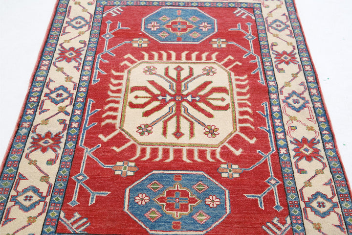 Kazak 3’ 4″ x 5’ 3″ - No. AV42447 - ALRUG Rug Store