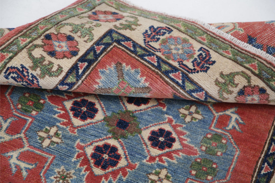 Kazak 2’ 10” x 4’ 0″ - No. AV17701 - ALRUG Rug Store