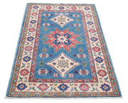 Kazak 3’ 2″ x 4’ 10” - No. AV27987 - ALRUG Rug Store