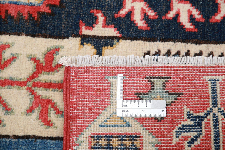 Kazak 4’ 11” x 6’ 7″ - No. AV96333 - ALRUG Rug Store