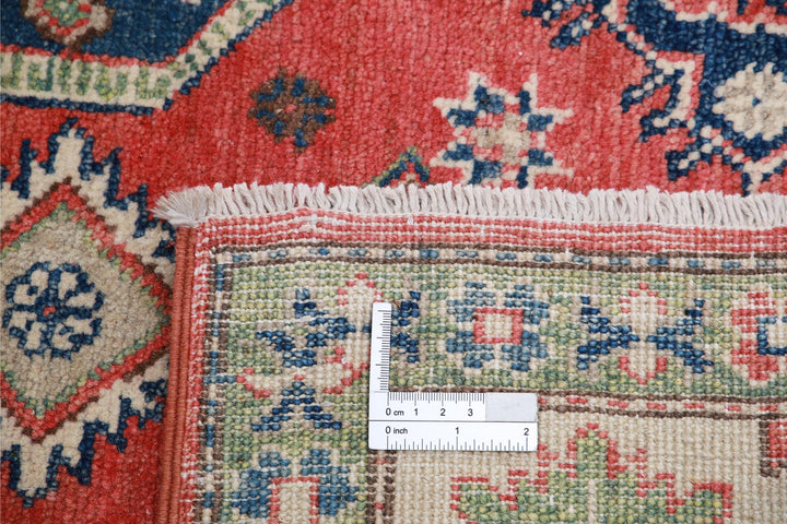 Kazak 4’ 10” x 6’ 0″ - No. AV77844 - ALRUG Rug Store