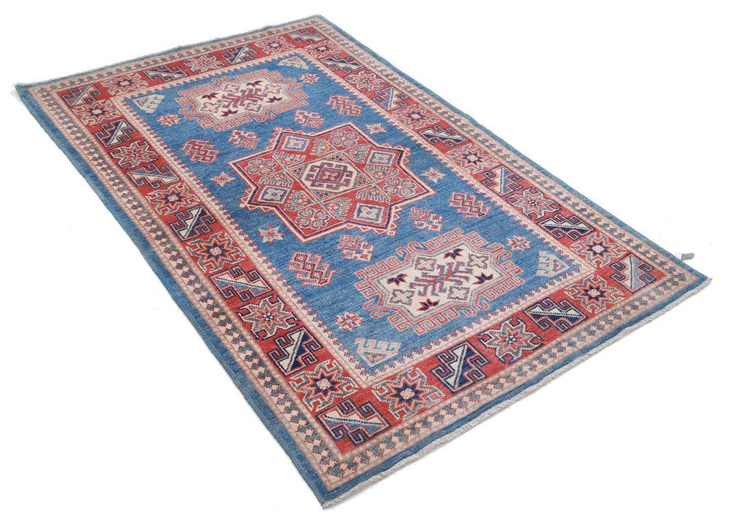 Kazak 3’ 11” x 6’ 0″ - No. AV75416 - ALRUG Rug Store