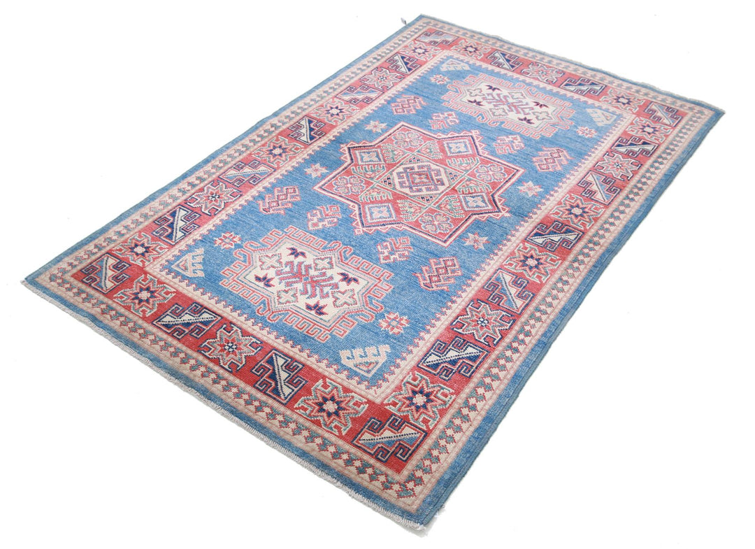 Kazak 3’ 11” x 6’ 0″ - No. AV75416 - ALRUG Rug Store