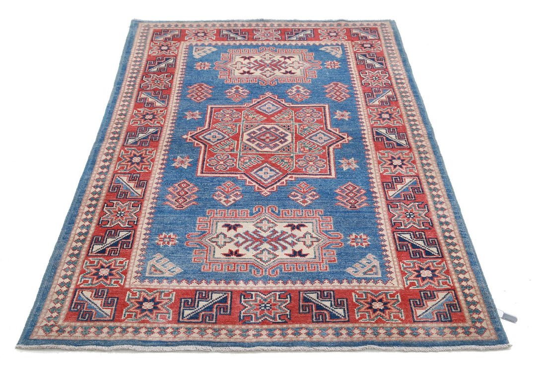 Kazak 3’ 11” x 6’ 0″ - No. AV75416 - ALRUG Rug Store